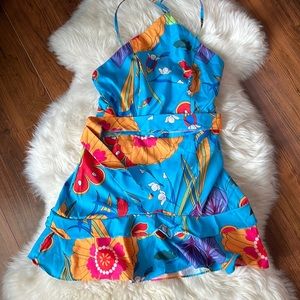 Mini dress. Floral, tropical colors. Above the knee. New with tags.